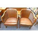 PAIR OF EARLY 20TH CENTURY LEATHER & WALNUT TUB CHAIRS