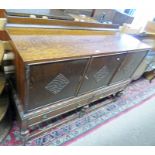 EARLY 20TH CENTURY OAK SIDEBOARD WITH 3 PANEL DOORS OVER 2 DRAWERS ON BALUSTER SUPPORTS