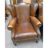 20TH CENTURY BROWN LEATHER WINGBACK ARMCHAIR ON SQUARE SUPPORTS Condition Report: