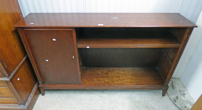 MAHOGANY BOOKCASE WITH PANEL DOOR OPENING TO SHELVED INTERIOR & SHELVED AREA .