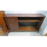 MAHOGANY BOOKCASE WITH PANEL DOOR OPENING TO SHELVED INTERIOR & SHELVED AREA .