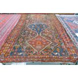 RED GROUND MIDDLE EASTERN RUG - 205 X 120 CM Condition Report: Heavily worn,