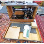 SINGER SEWING MACHINE MODEL EJ54047 IN WOODEN CARRY CASE