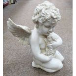 FIGURE OF A WINGED CHERUB HOLDING A RABBIT,