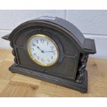 EARLY 20TH CENTURY OAK MANTLE CLOCK WITH BARLEY TWIST DECORATION & WHITE ENAMEL DIAL