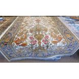 MIDDLE EASTERN CARPET DECORATED WITH BIRDS AND FOLIAGE WITH A COPPER SEAL