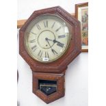 MAHOGANY CASED LATE 19TH CENTURY WALL CLOCK WITH CARVED DECORATION.