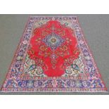 RED GROUND PERSIAN TABRIZ CARPET WITH MEDALLION DESIGN 293 X 208CM