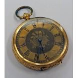 YELLOW METAL OPEN FACE FOB WATCH WITH ENGRAVED DIAL,