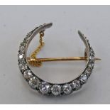 LATE 19TH CENTURY CRESCENT SHAPED OLD BRILLIANT CUT DIAMOND SET BROOCH Condition Report: