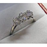 A DIAMOND THREE STONE RING SET WITH THREE BRILLIANT-CUT DIAMONDS. APPROX 1.