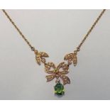 9CT GOLD PEARL AND PERIDOT SET PENDANT ON FINE CHAIN