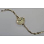 9CT GOLD LADYS ROLEX WRISTWATCH ON A 9CT GOLD BRACELET - 20.