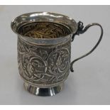 MALAYSIAN SILVER FLORAL DECORATED MUG WITH MARK TO BASE - 105 G