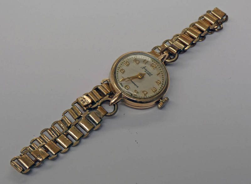 9CT GOLD ACCURIST WRIST WATCH ON METAL BRACELET