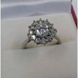 DIAMOND SET CLUSTER RING, THE CENTRE DIAMOND OF APPROX 1.00 CARATS, THE REMAINING DIAMONDS APPROX 0.