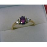 9CT GOLD RUBY & DIAMOND SET 3 STONE RING,