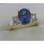 18K WHITE GOLD 3-STONE TANZANITE & DIAMOND RING,