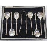 CASED SET OF 6 SILVER SPOONS & SILVER TONGS.