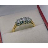 18CT GOLD THREE STONE DIAMOND SET RING