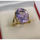 9CT GOLD AMETHYST SET RING Condition Report: Ring size: O.