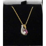 9CT GOLD RUBY & DIAMOND PENDANT ON FINE CHAIN MARKED 375 WITH CERTIFICATES