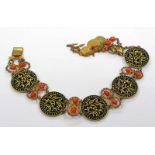 ARABIC GILT BRACELET THE 5 COINS INTERSPERSED WITH CORAL BEADS - 17.