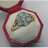 DIAMOND CLUSTER RING IN SETTING MARKED 18