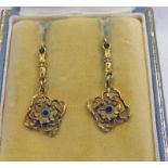 PAIR OF YELLOW GOLD SAPPHIRE SET ART NOUVEAU STYLE EARRINGS IN AN ANNE BLOOM JEWELLERS,