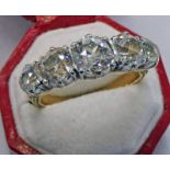 5 STONE DIAMOND SET RING IN UNMARKED SETTING. THE DIAMONDS OF APPROX. 2.