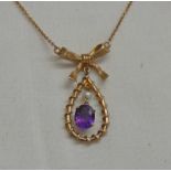 9CT GOLD AMETHYST & SEED PEARL SET PENDANT ON FINE 9CT GOLD CHAIN