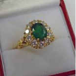 18CT GOLD, EMERALD AND DIAMOND CLUSTER RING,