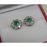PAIR OF EMERALD AND DIAMOND EARSTUDS WITH CIRCULAR EMERALDS TO THE CENTRE SURROUNDED BY ROUND