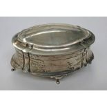 OVAL SILVER JEWELLERY BOX ON 4 SHAPED SUPPORTS,