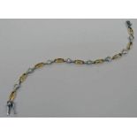 FANCY LINKED 2 - TONE BRACELET SET WITH GEM STONES THE CLASP MARKED 18KT - 18CM LONG, 10.