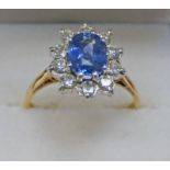 18CT GOLD SAPPHIRE AND DIAMOND SET RING,