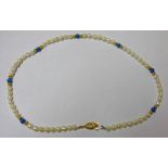 CULTURED PEARL AND LAPIS SET NECKLACE Condition Report: Length when closed: 23cm.