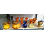 SELECTION OF COLOURED GLASS INCLUDING ROSE BOWL VASES ETC OVER ONE SHELF Condition