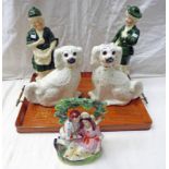 PAIR OF 19TH CENTURY POTTERY DOGS,