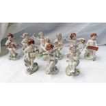 9 19TH CENTURY CONTINENTAL PORCELAIN MUSICAL CHERUB FIGURES, TALLEST 11.