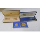 CROSS PEN & PENCIL SET AND OTHER TOGETHER WITH 2 COMMEMORATIVE COINS