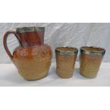 SILVER RIMMED POTTERY JUG & 2 SILVER RIMMED BEAKERS