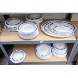 BLUE & WHITE FLORAL DECORATED DINNER SERVICE ON 2 SHELVES