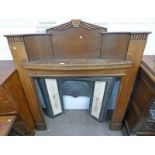 20TH CENTURY OAK FIRE SURROUND WITH CAST IRON FIRE INSERT