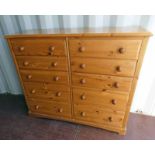 PINE CHEST OF DRAWERS WITH 10 DRAWERS ON BRACKET SUPPORTS