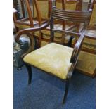 EARLY 19TH CENTURY MAHOGANY CARVER ARM CHAIR ON SABRE SUPPORTS