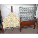 MAHOGANY FRAMED BED WITH SHAPED HEADBOARD