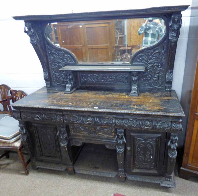 19TH CENTURY CARVED OAK MIRROR BACK SIDEBOARD WITH 4 DRAWERS & 2 PANEL DOORS & FIGURAL DECORATION