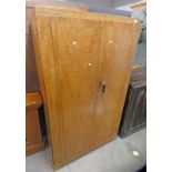 BIRDS EYE MAPLE WARDROBE WITH 2 PANEL DOORS OPENING TO DRAWERS & HANGING AREA.