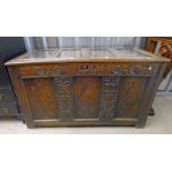 18TH CENTURY OAK COFFER WITH 4 PANEL TOP AND DECORATIVE FRONT WITH DATE 1701.